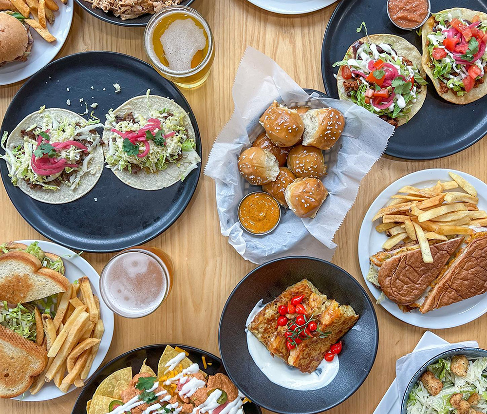 Food & cider on a table at Ash & Elm